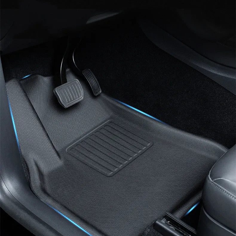 Tesla Model Y custom TPR floor mats showing foot mats, front storage box mat, and tailbox mats