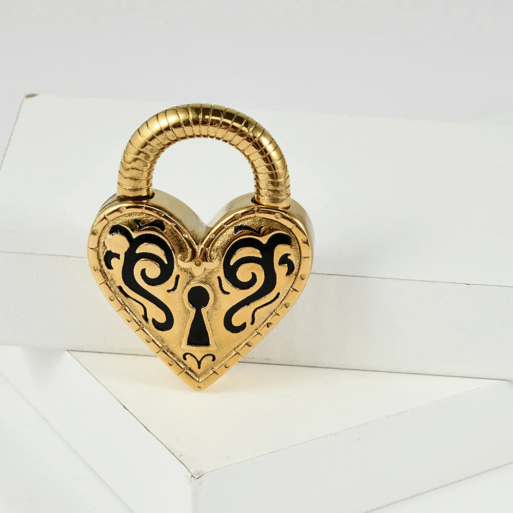 Women's heart-shaped stainless steel earrings in gold and steel colour options.