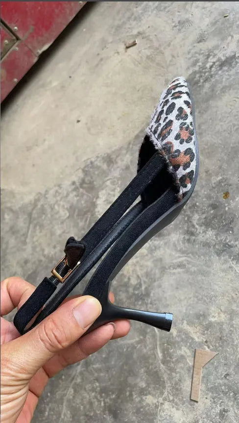 Women's leopard print suede sandals with pointed toe design on size display
