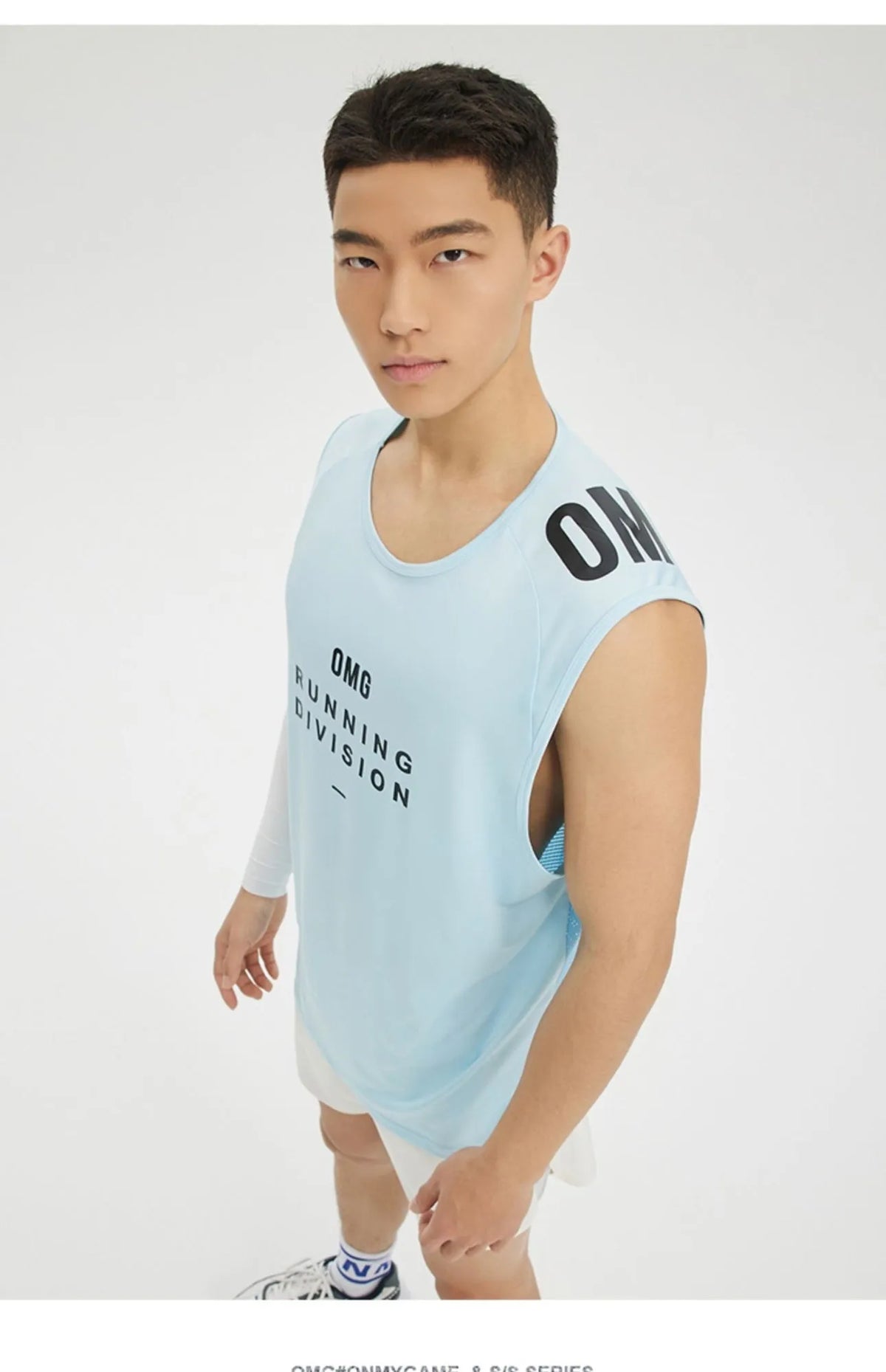 Men's loose fit mesh sports vest in black, shown front on, for summer running and gym workouts.