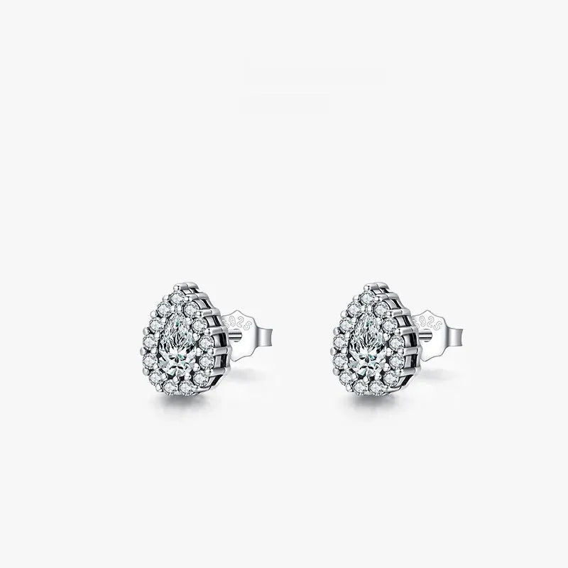 A pair of women's sterling silver water drop ear studs with a diamond-cut shiny finish.