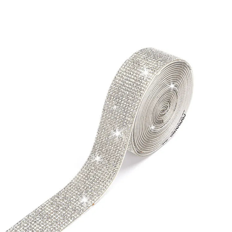 A long strip of self-adhesive glass rhinestones for hot-fix application on clothing and shoes.