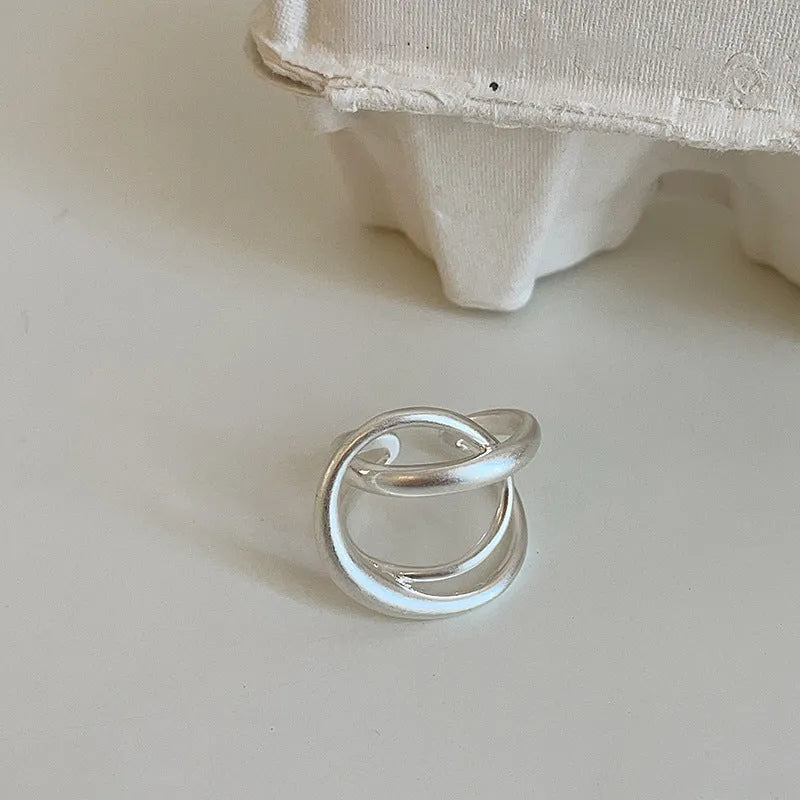 Women's geometric open ring with three-dimensional interlaced matte metal design