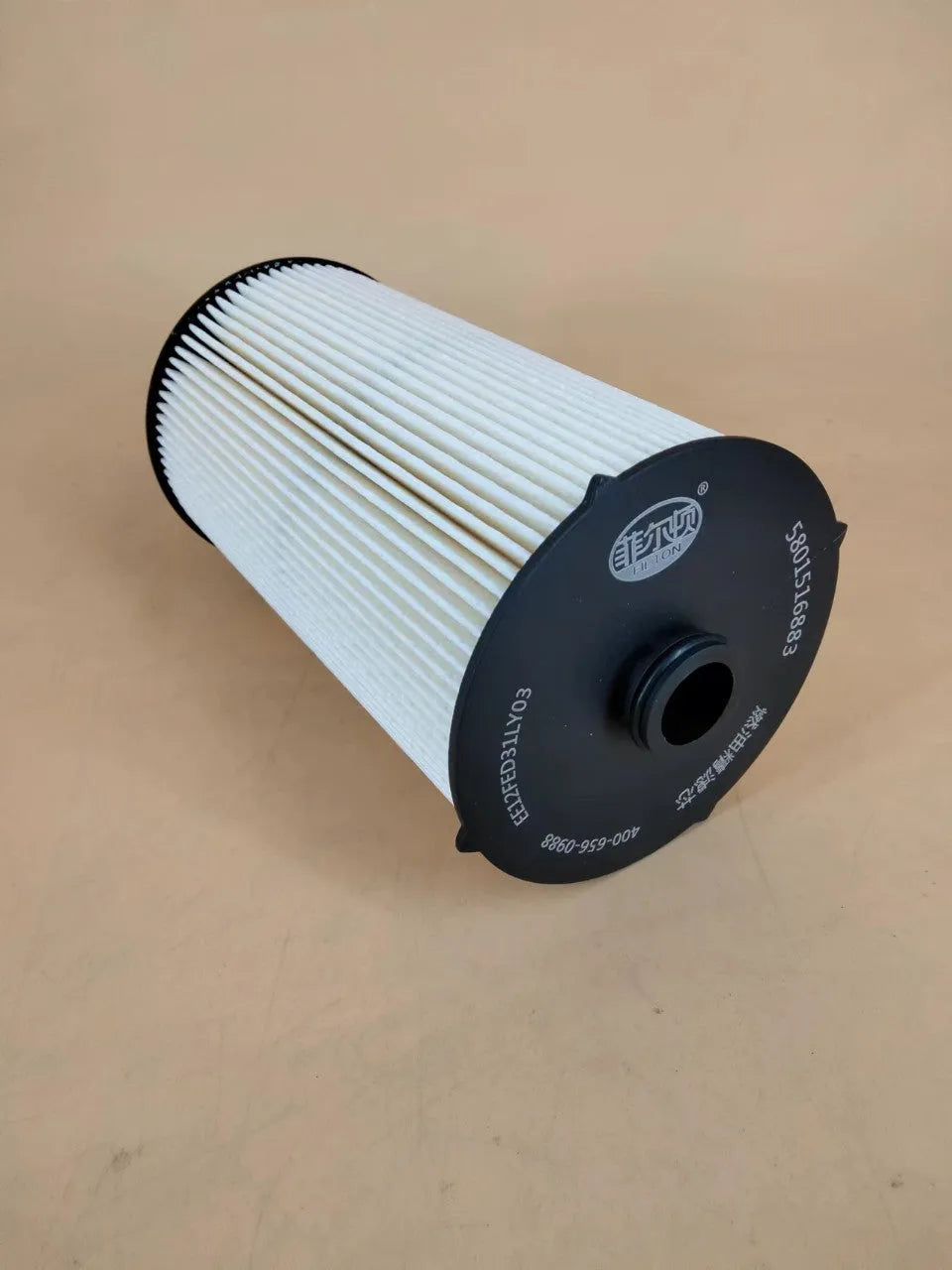 IVECO 5801516883 5801439821 fuel filter with a white housing and visible folding filter element inside.
