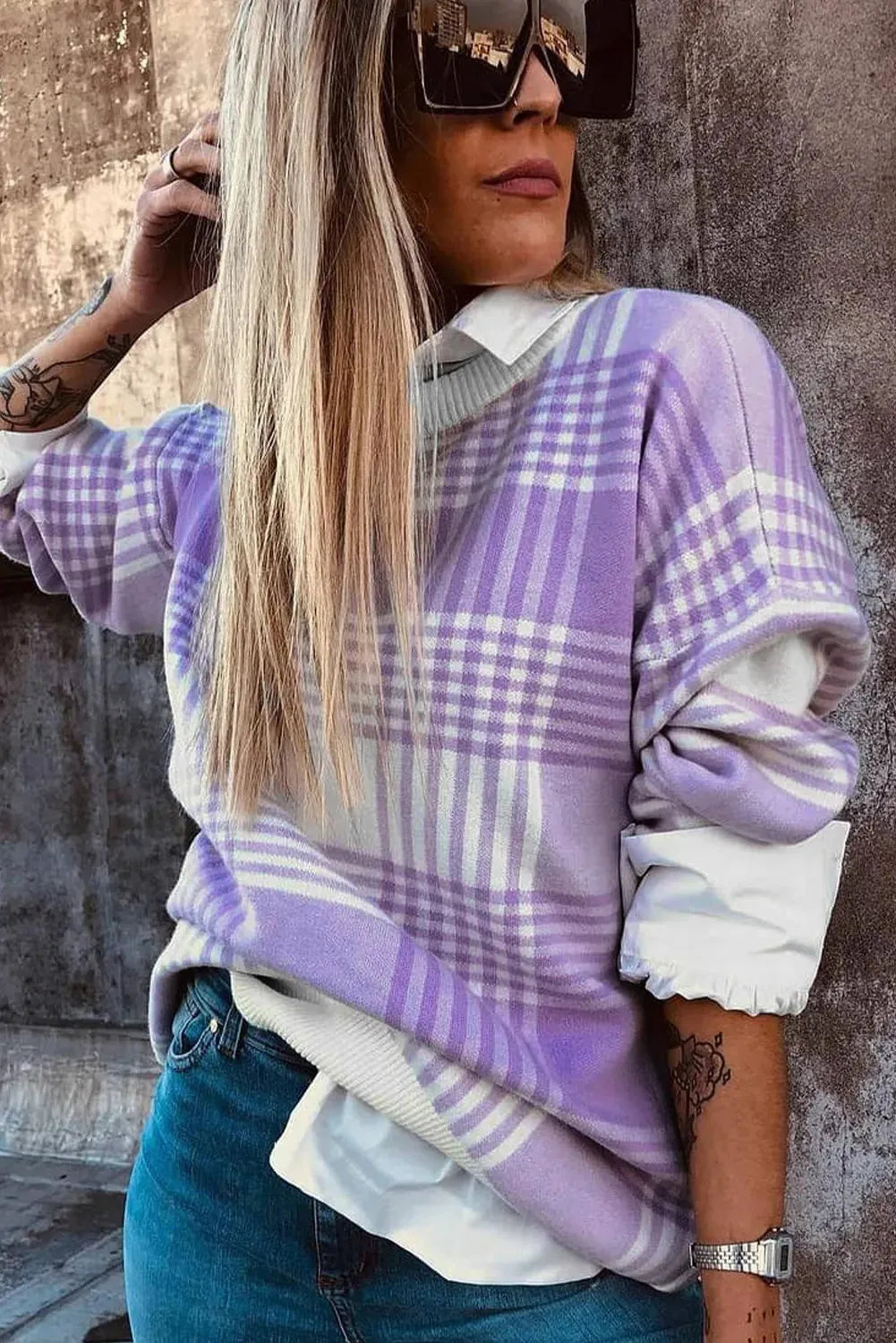 Lilac plaid print loose sweater with ribbed trim at neckline and cuffs on hanger