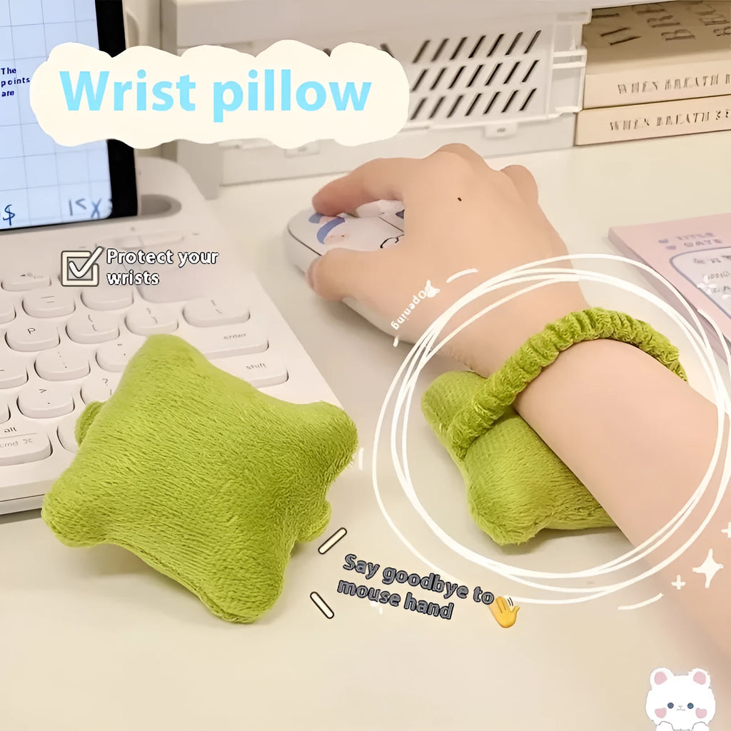 Plush wrist protector mouse pad in blue, green, or pink colour options on a desk.