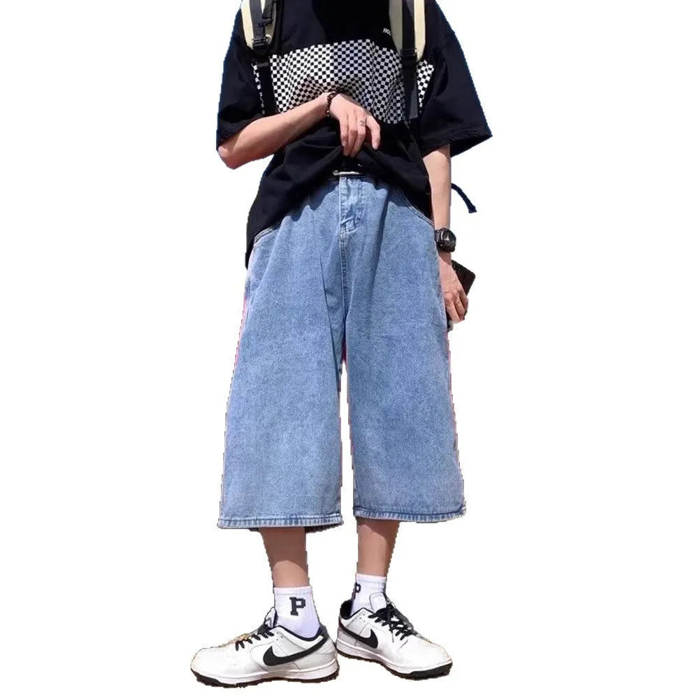 Men's blue washed denim pirate shorts with a straight leg and high waist.