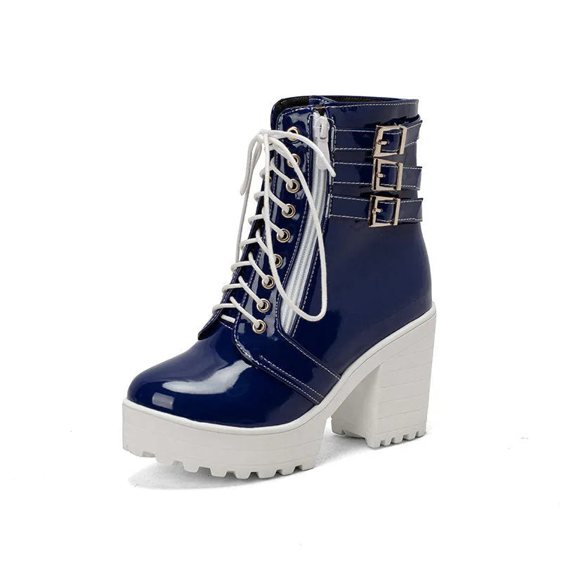 Women's black thick-heeled short boots with lace-up front and waterproof platform on a rubber sole.