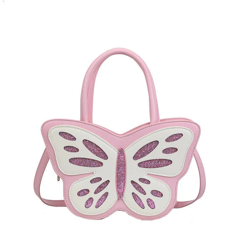 Small square crossbody bag in PU material showing contrast colour detailing and adjustable strap