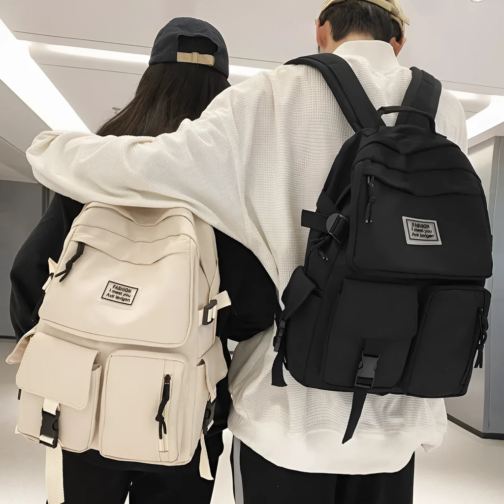Black and white nylon student backpack with laptop compartment and external pockets