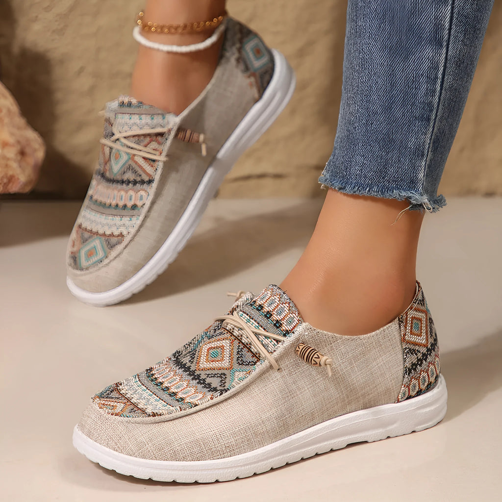 Women's flat slip-on shoes with round toe design in black, dark grey, or khaki colours