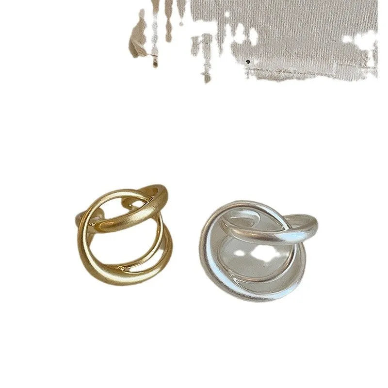 Women's geometric open ring with three-dimensional interlaced matte metal design