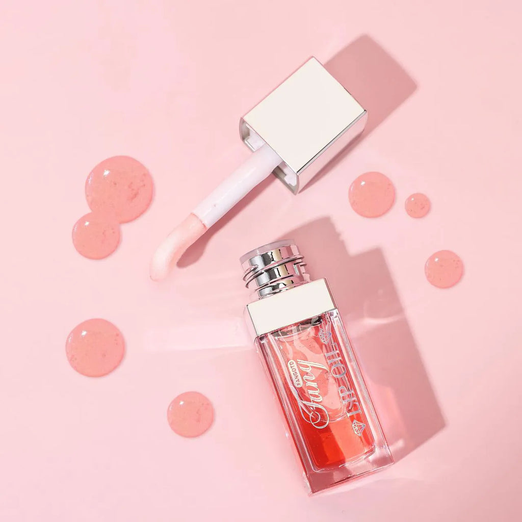 Five colour shades of moisturising lip gloss mint lipstick with lip essence oil.