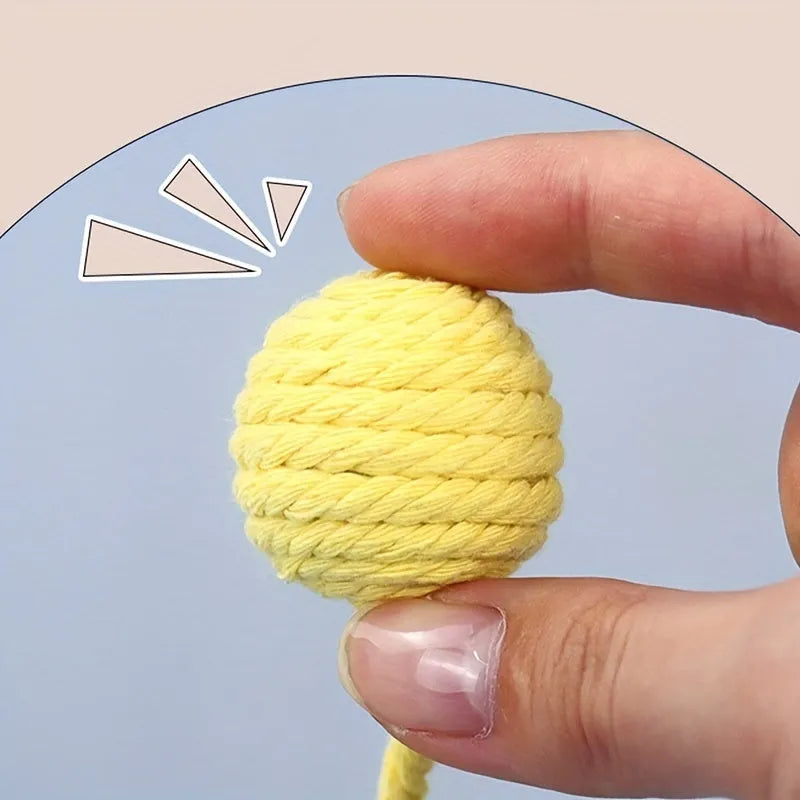 Colourful cat toy ball with rope and internal bell in small and medium sizes.