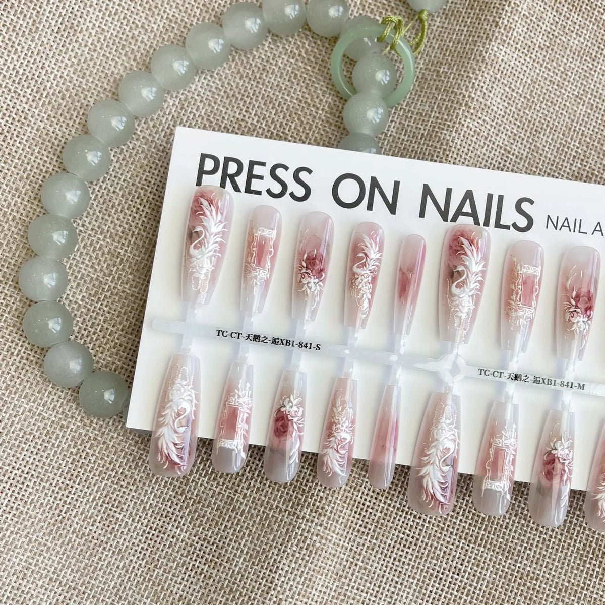 Antique swan relief embroidery press-on nail tips, 40pcs set in SMSXS, with matte or glossy finish options.