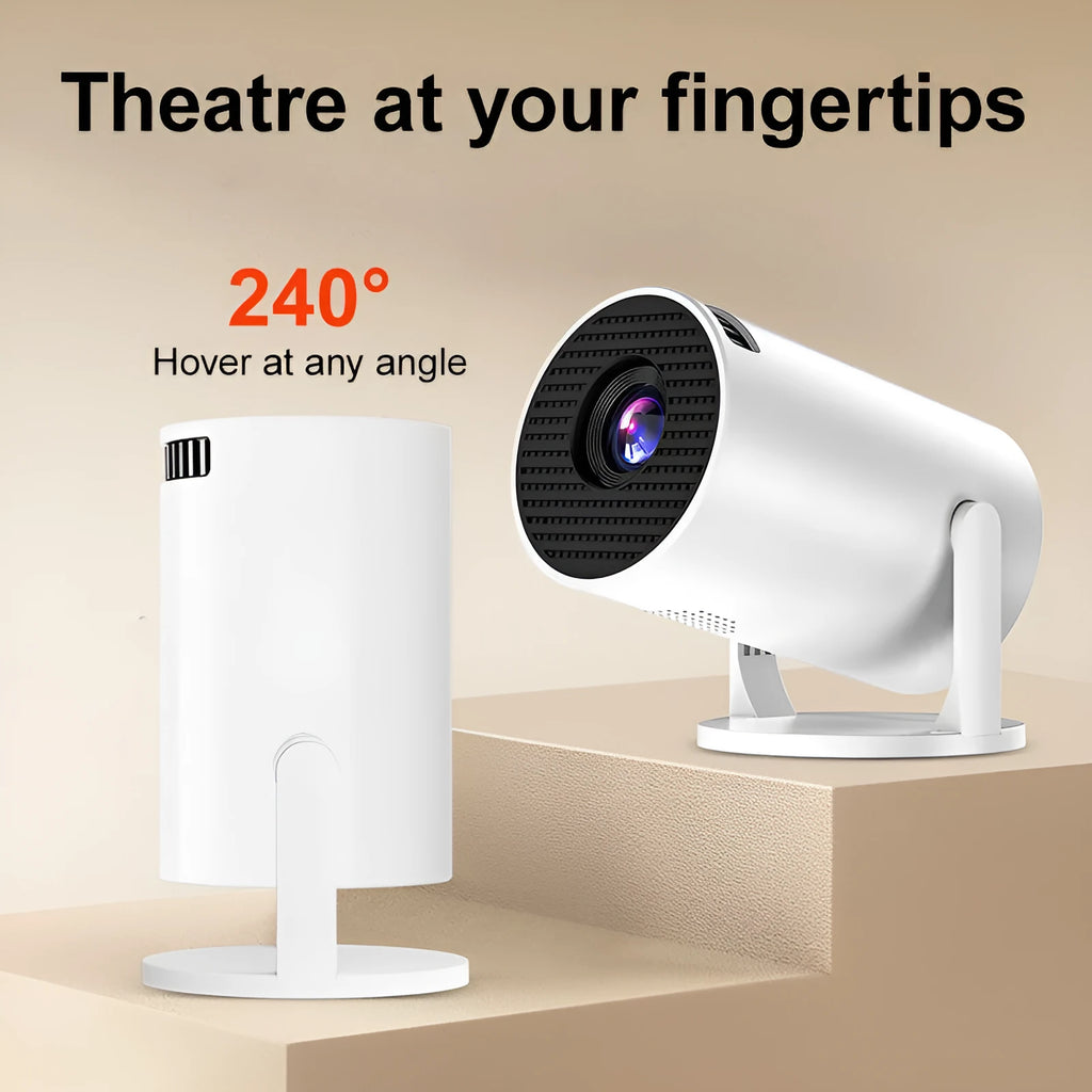 White mini wireless portable HD projector for home cinema on a table.