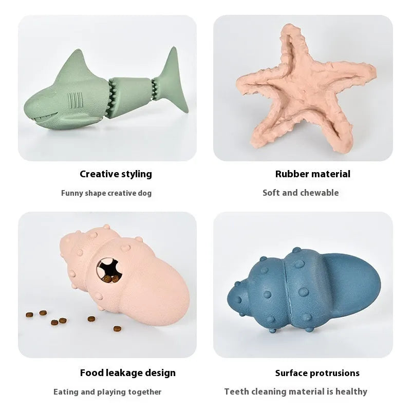 Blue deep sea shark-shaped rubber dog chew toy on a white background.