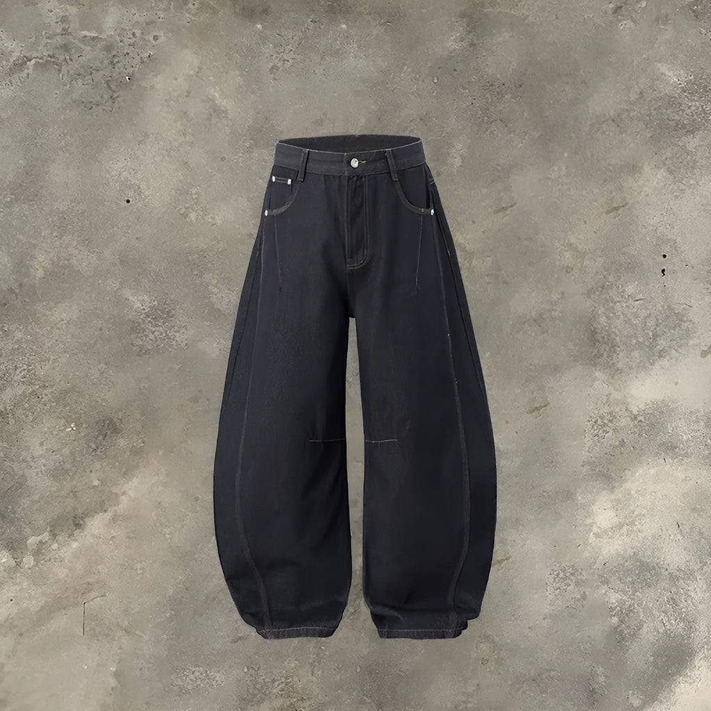 Men's original cow colour wide leg denim trousers on a mid-waist model.