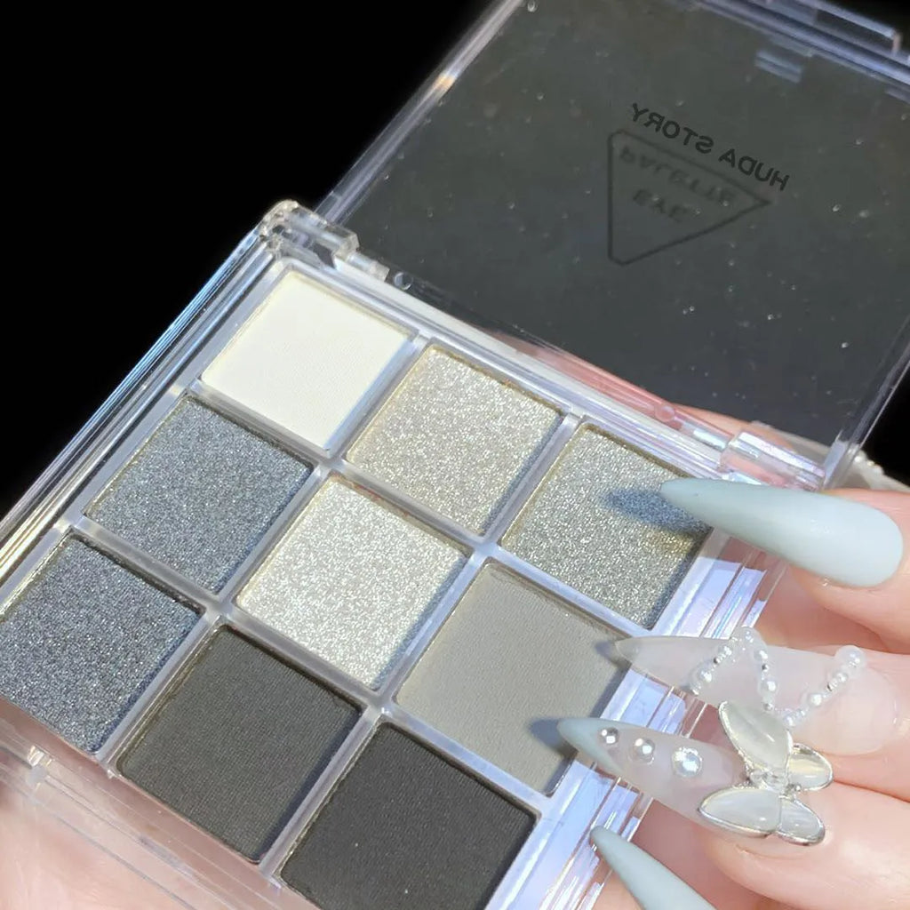 INS style nine-colour eye shadow palette showing white, silver, black, and iron grey shades.