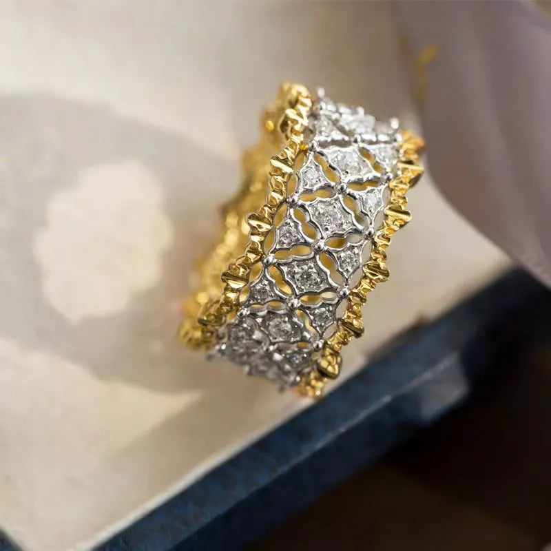 Gold two-tone geometric zircon ring with round elements on copper with electroplated finish