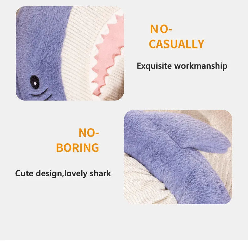 Blue shark pattern pet bed cushion on a hardwood floor, showing non-slip bottom.