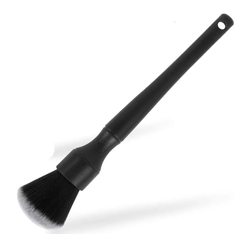 Black car detailing brush with super soft pig hair bristles shown in two size options for interior cleaning
