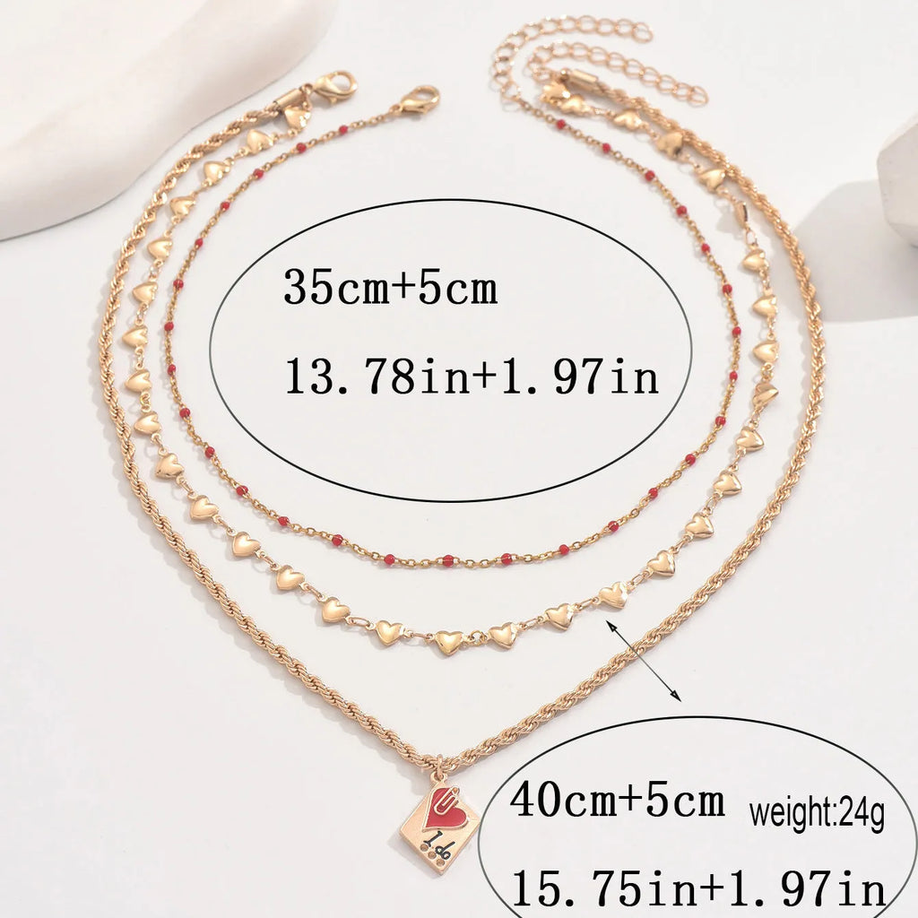 Adjustable geometric heart clavicle necklace with three-layer zinc alloy pendant on chain