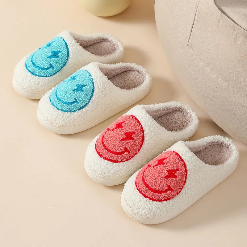 Women's plush cartoon love style home slippers with a round toe and PVC sole.