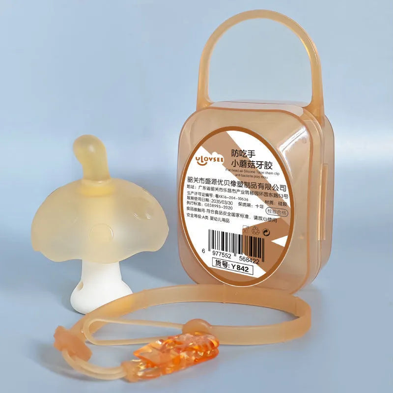 Small pink or grey latex mushroom fidget gum in a transparent box with a chain.