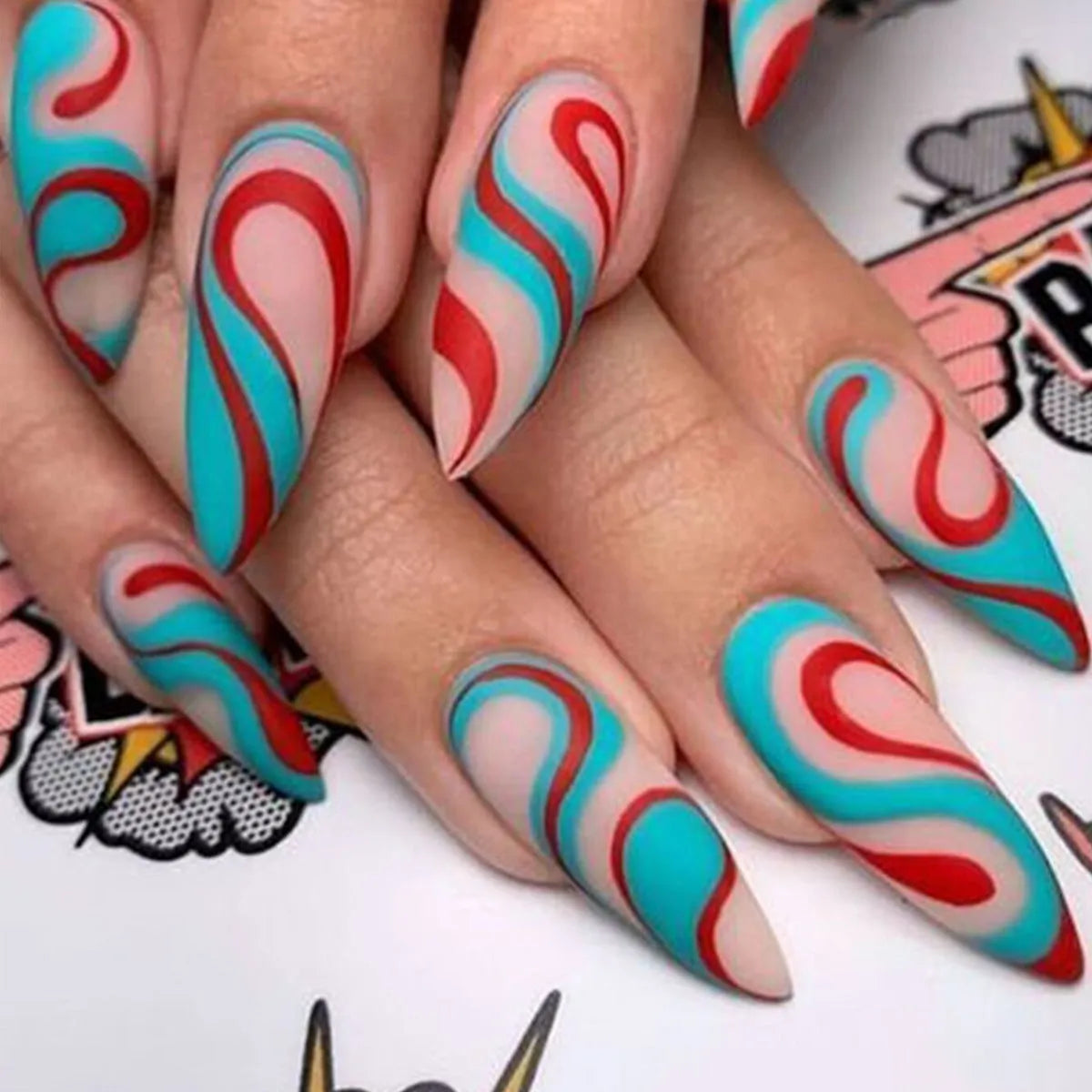 Almond-shaped rainbow nail stickers with plaid pattern in four colour designs on a hand.