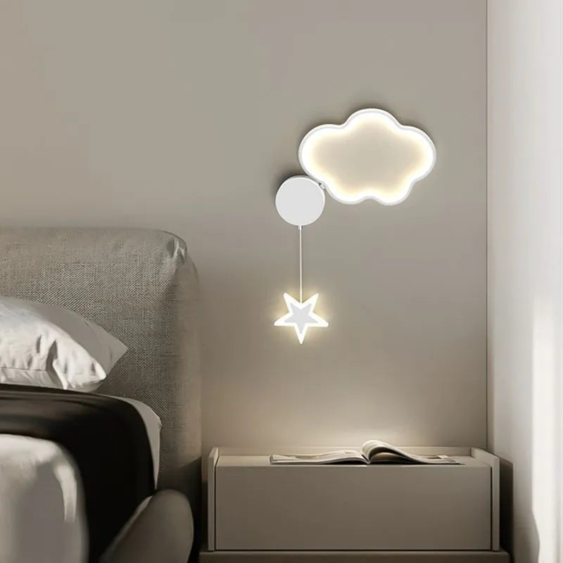 Cloud and star shaped children's bedside wall lamp with LED lighting in black or white finish