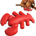Red hard dog chew toy for large aggressive chewers on a plain background
