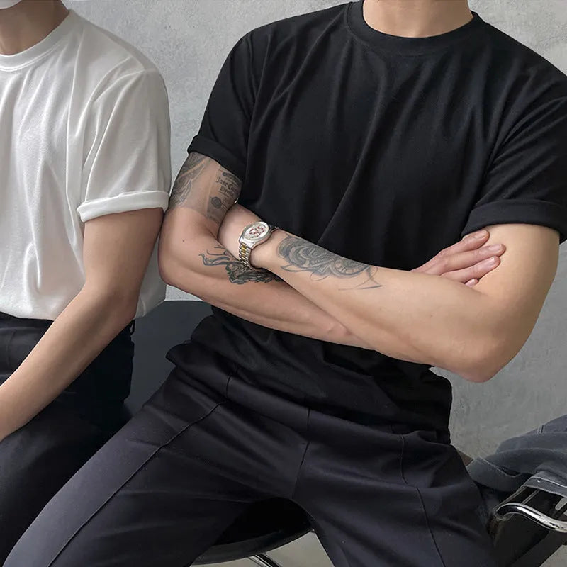 Men's slim fit round neck cotton t-shirt in black solid colour on a white background