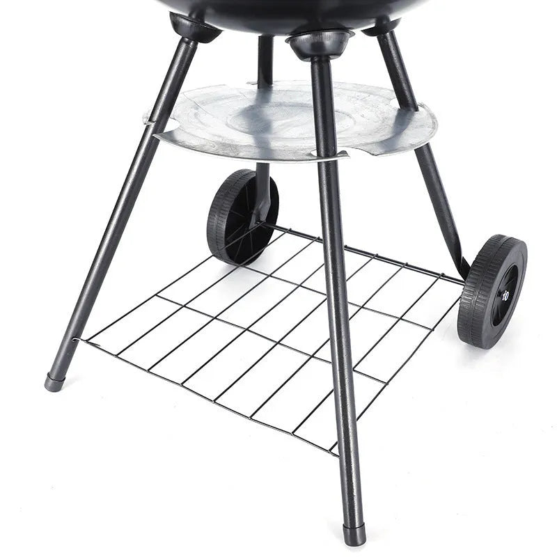 Portable iron barbecue grill with a 14-inch apple stove design for outdoor cooking.