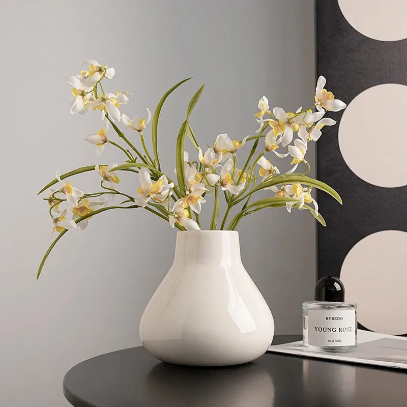 Ceramic round belly French-style vase with decorative flowers in black or white colour options