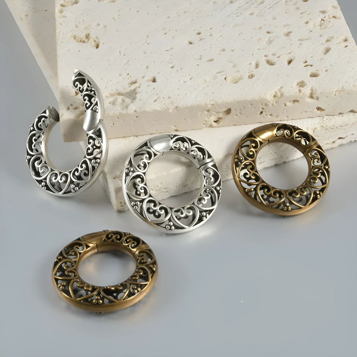 Retro magnetic earrings with hollow heart and lotus designs in antique silver and gold finishes