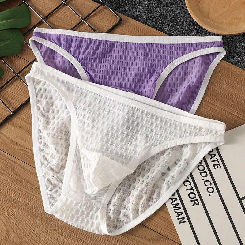 Men's low waist transparent lace underwear in multiple colours on a size chart
