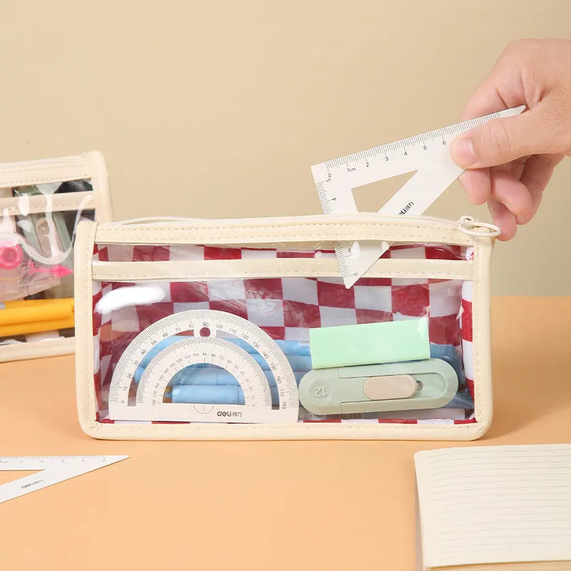 PVC transparent pencil case with chessboard pattern showing pens inside, dimensions 21.5 x 8 x 11.5 cm