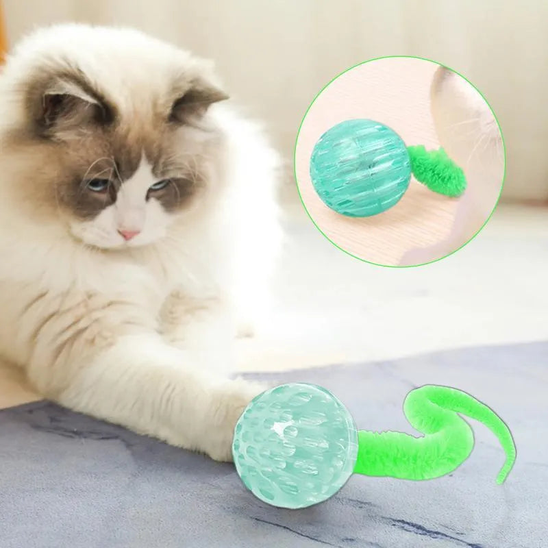 Interactive cat ball toy with bouncy TPR rubber core and removable plush tail, shown in green colour
