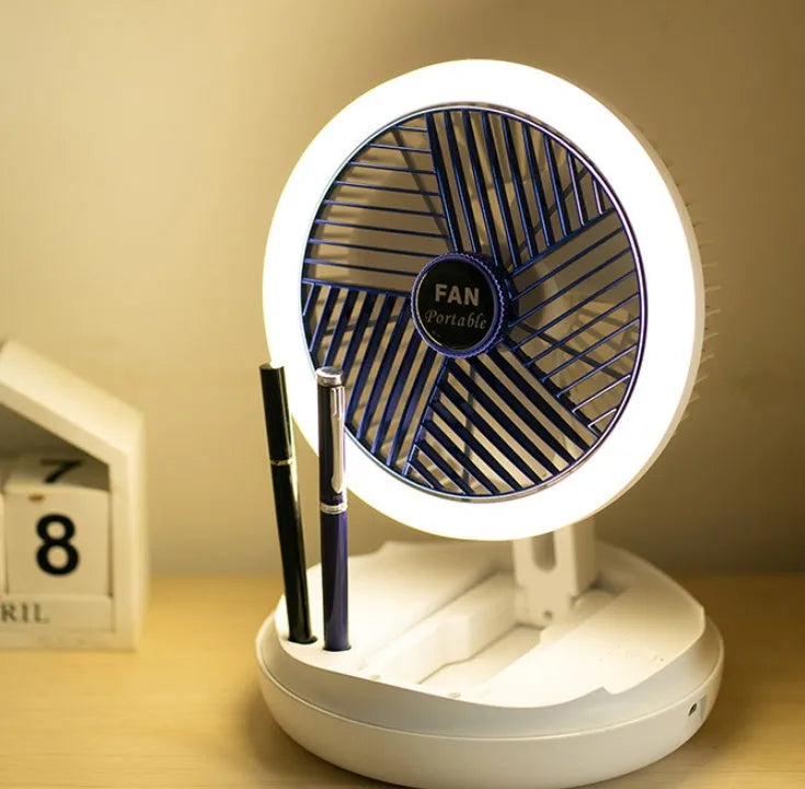 Blue foldable table fan with LED light showing 300° rotation angle and pen holder design