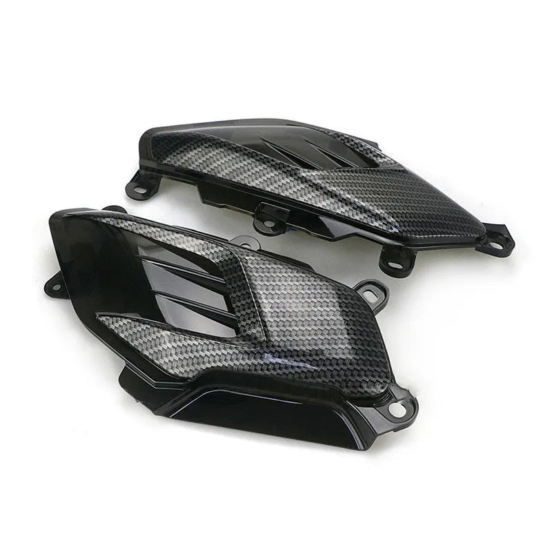 Yamaha NMAX LED side lamp replacement kit with carbon fibre decoration showing ABS plastic construction