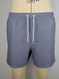 Navy blue striped beach shorts with straight leg opening and triangle lining, flat lay.