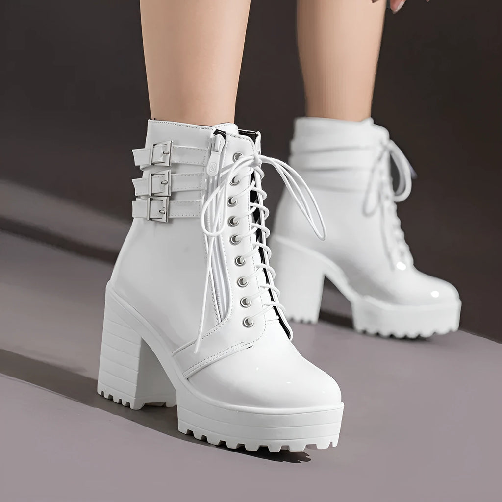 Women's black thick-heeled short boots with lace-up front and waterproof platform on a rubber sole.
