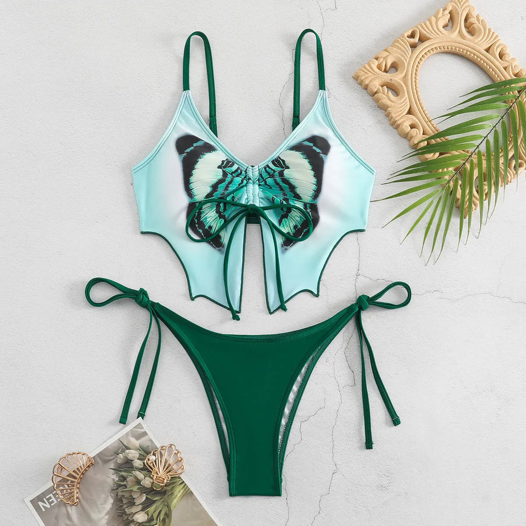 Women's purple bikini swimsuit with bow decoration on the top and split high-waisted briefs.