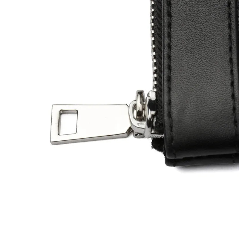 Black genuine cowhide leather men's clutch wallet showing 20cm by 10cm dimensions