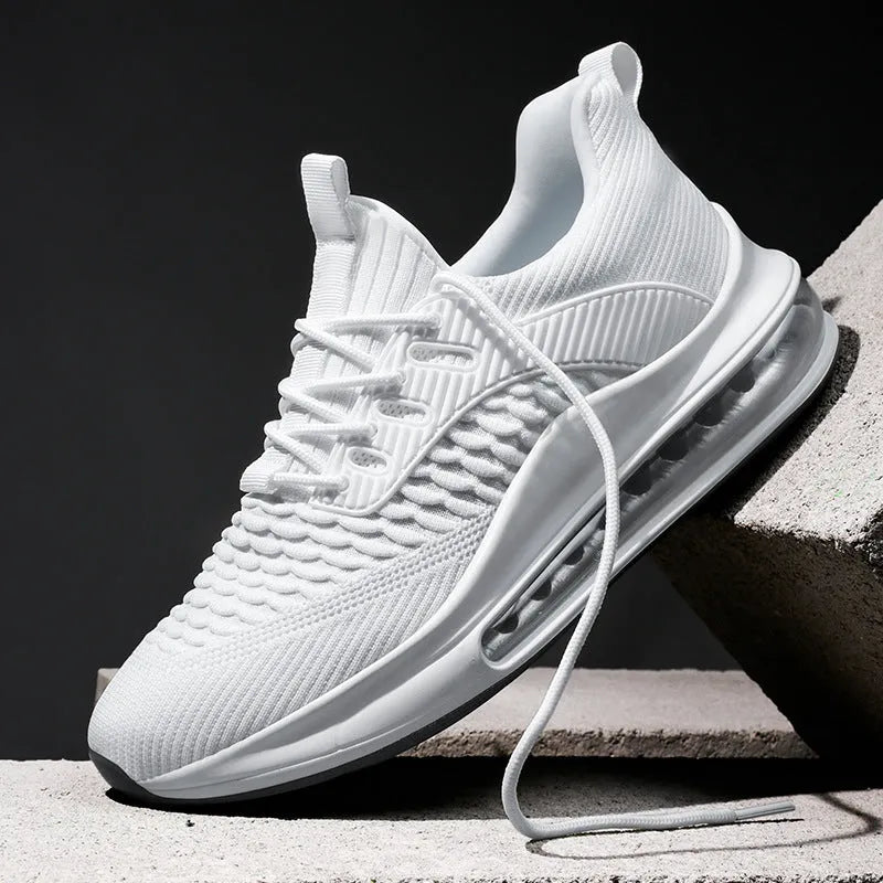 Men's solid-colour low-top mesh running shoes with lace-up front and rubber sole.