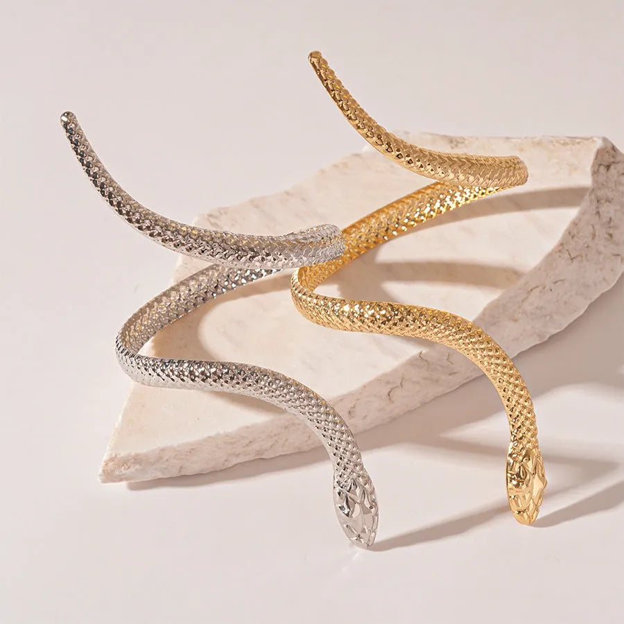 Exaggerated twisted winding simulated snake metal ring and bracelet jewellery set in gold and silver electroplated finishes