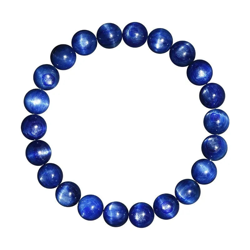 Natural blue crystal bead bracelet with geometric design and polished finish on a wrist.