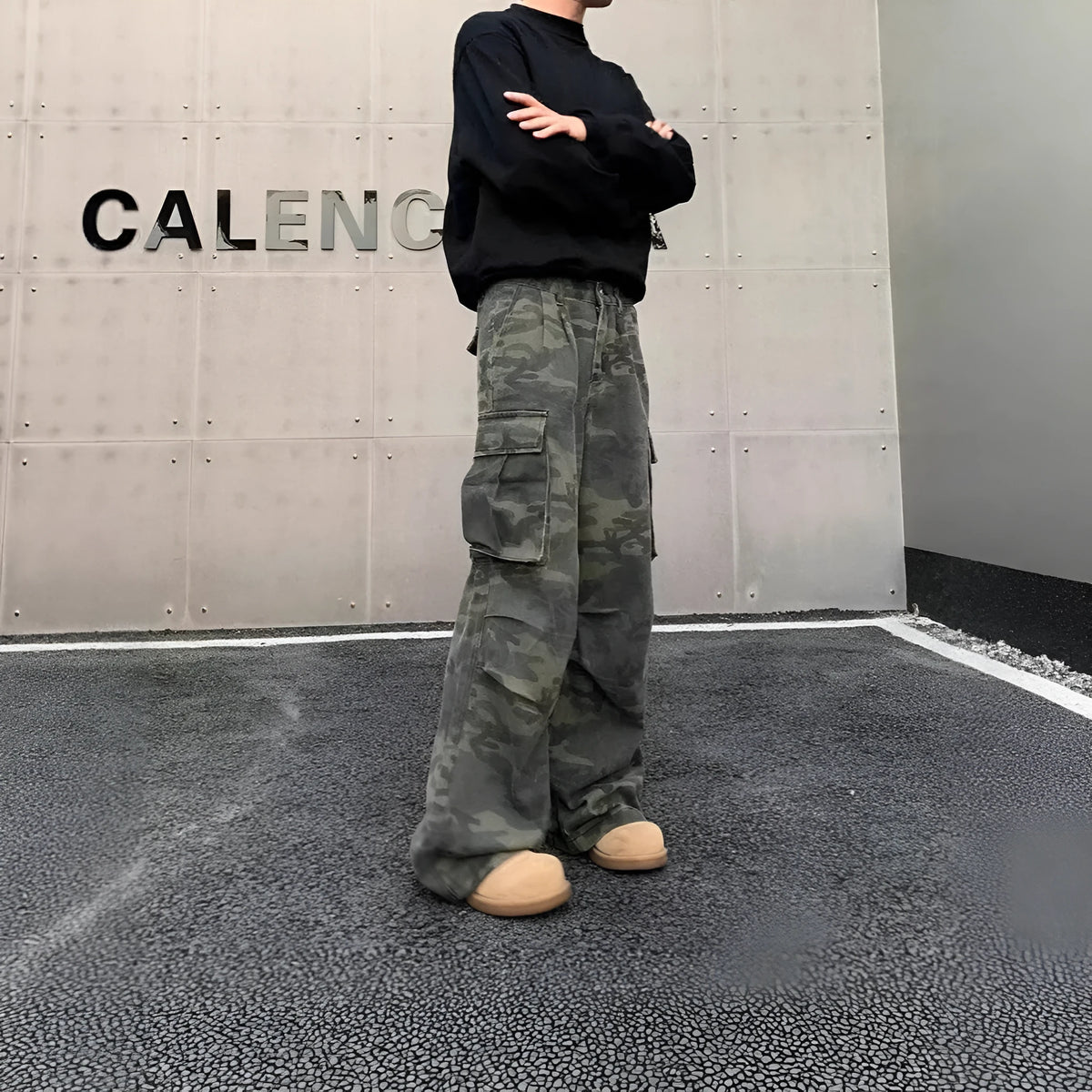 Washed camouflage cotton blend cargo trousers with multiple pockets on a mid-rise waist.