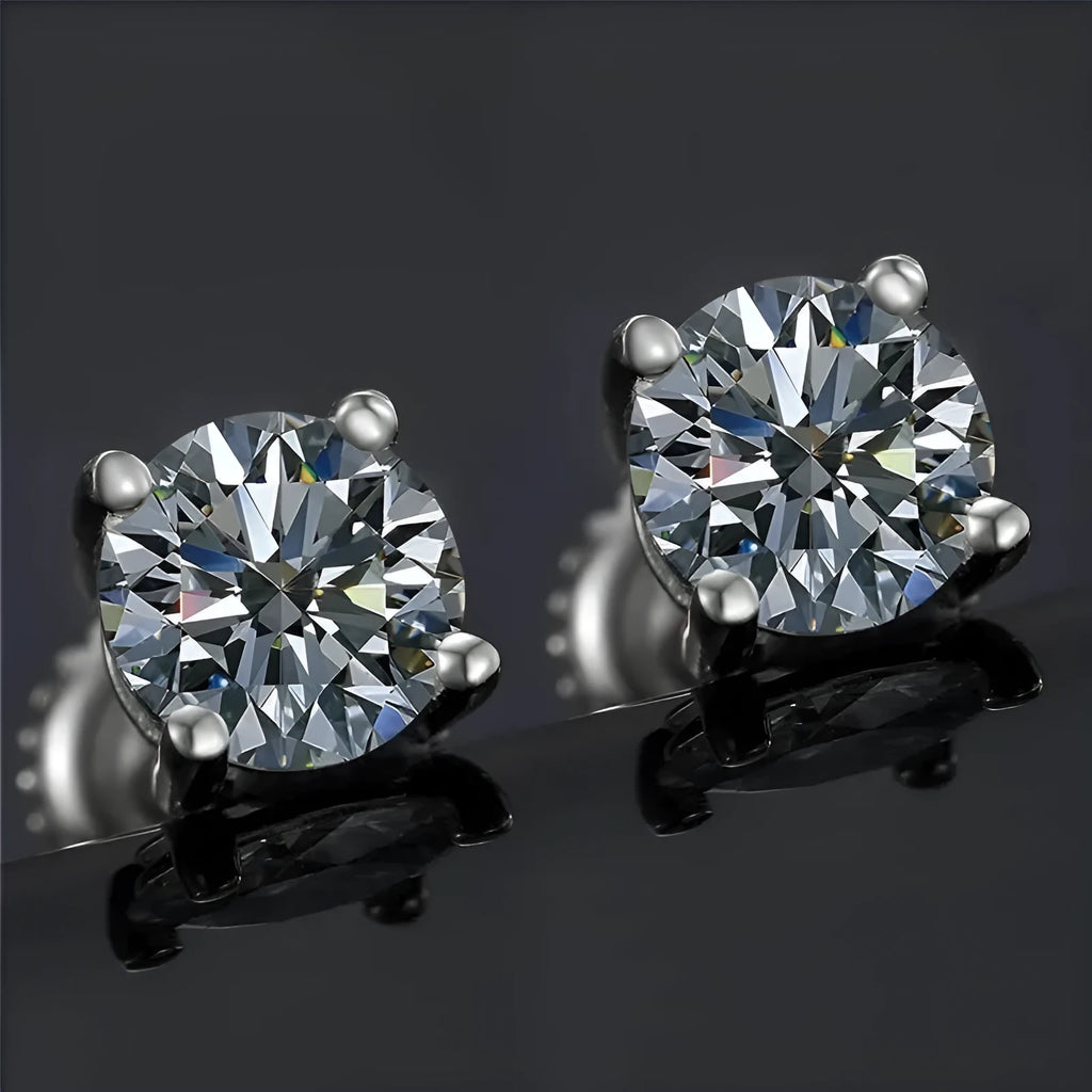 Silver moissanite screw back stud earrings with geometric shape on black card